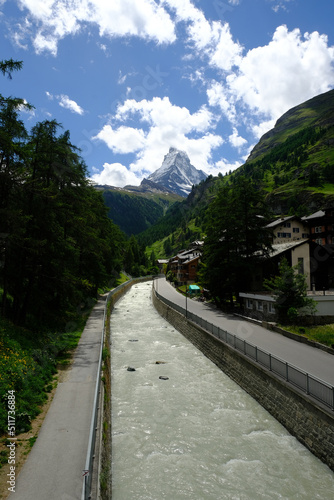 A picture of Matterhorn with Zermatt Village and river insight. Zermatt, in southern Switzerland’s Valais canton, is a mountain resort renowned for skiing, climbing and hiking.