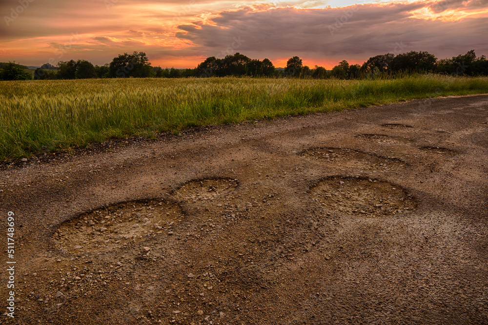 Sunrise over a hole in the road in Beskid Mały - obrazy, fototapety, plakaty 