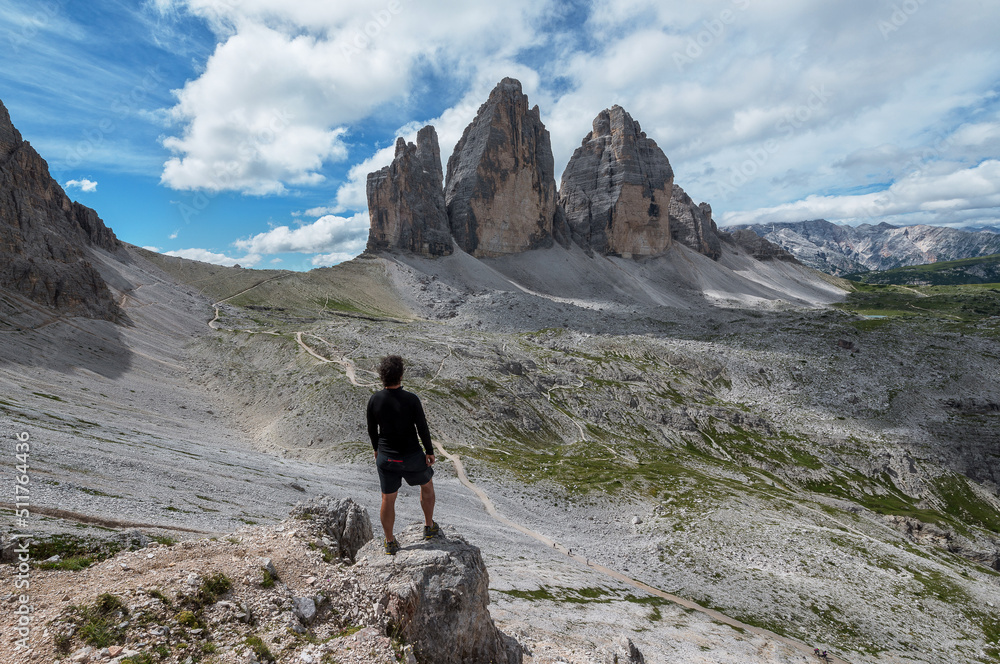 Male hiker hiking in the Dolomites mountains
