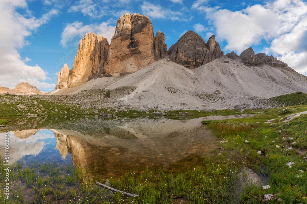 Mountain reflection in lake by Tre Cime di Lavaredo in Dolomites - obrazy, fototapety, plakaty 