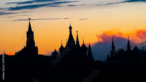 Black silhouette of Cathedral of Vasily the Blessed, Spasskaya Tower and Kremlin. Sunset sky. High quality photo © Andy Shell