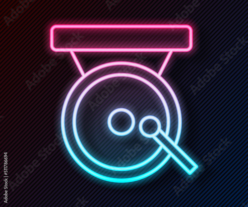 Glowing neon line Boxing gong icon isolated on black background. Boxing bell. Vector