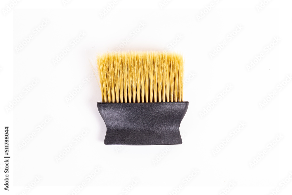 Nape neck hair removal brush for hairdressers barbers, isolated with white background, black color, plastic, oval handle, yellow brush Nape neck hair removal brush for hairdressers barbers, isolated with white background, black color, plastic, oval handle, yellow brush