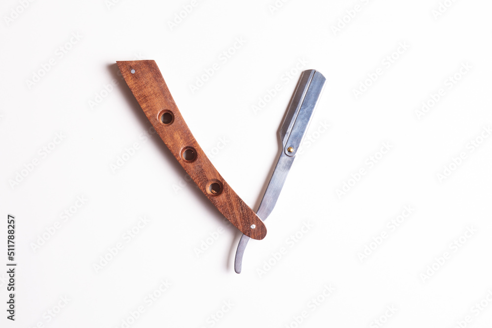 Beard razor with wooden handle, isolated with white background, barber hairdressing equipment beard razor Beard razor with wooden handle, isolated with white background, barber hairdressing equipment beard razor