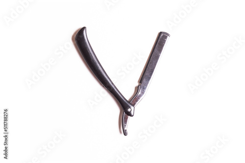 Beard razor with black handle, isolated with white background, barber hairdressing supplies beard razor