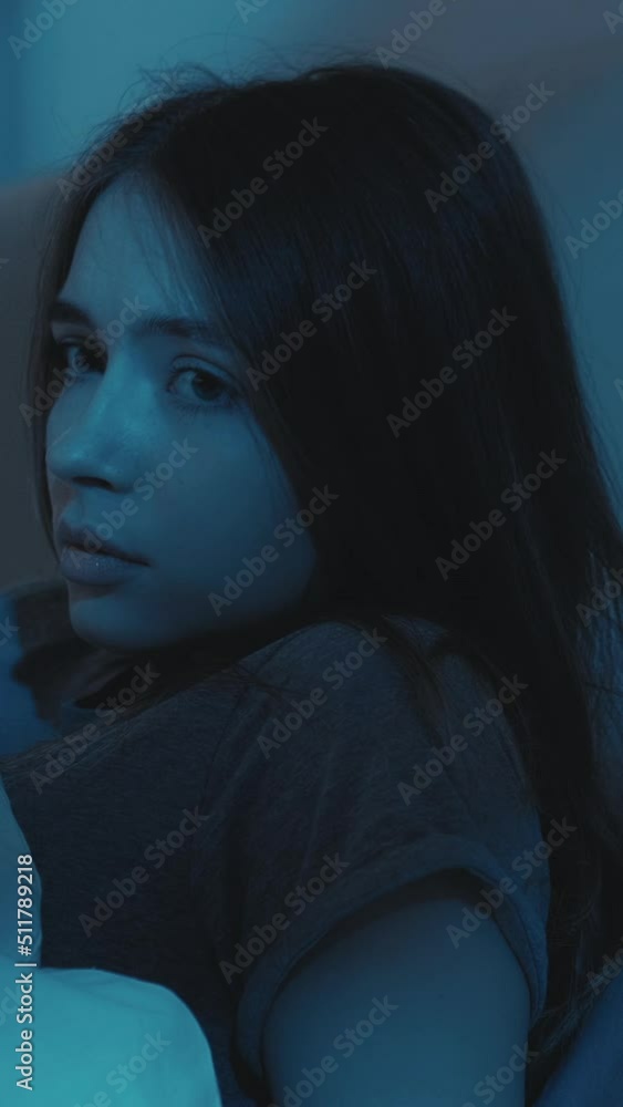 Bed nightmare. Sleep disorder. Bad dream. Disturbed scared woman waking