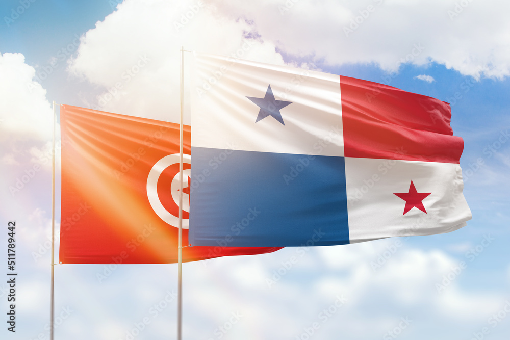Sunny blue sky and flags of panama and tunisia Sunny blue sky and flags of panama and tunisia