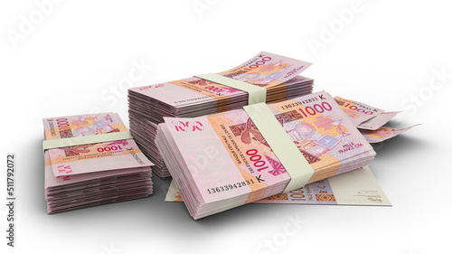 3D Stack of 1000 CFA Franc notes isolated on white background.