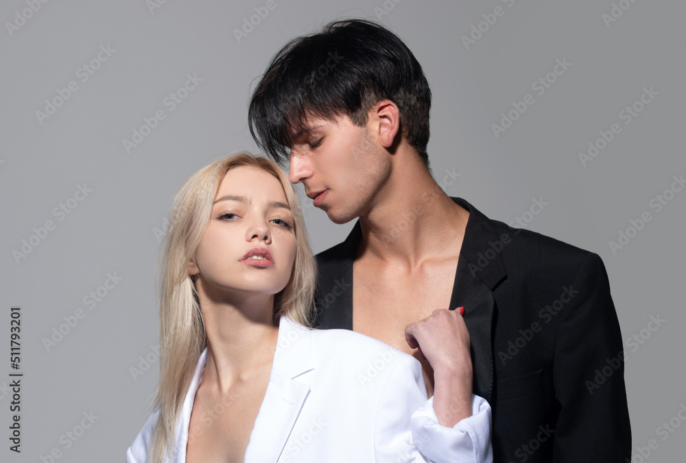 Young man and blonde woman. Sexy young couple in love. Young lovers hugging and embracing. Couple in love tenderness and affection. Young man and blonde woman. Sexy young couple in love. Young lovers hugging and embracing. Couple in love tenderness and affection.