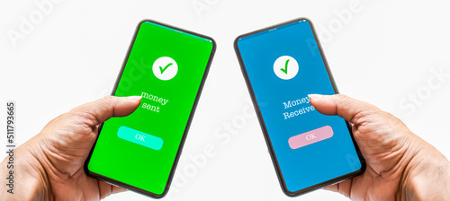 Obraz na plátně A person's hand holds a smartphone on screen with message money sent and received