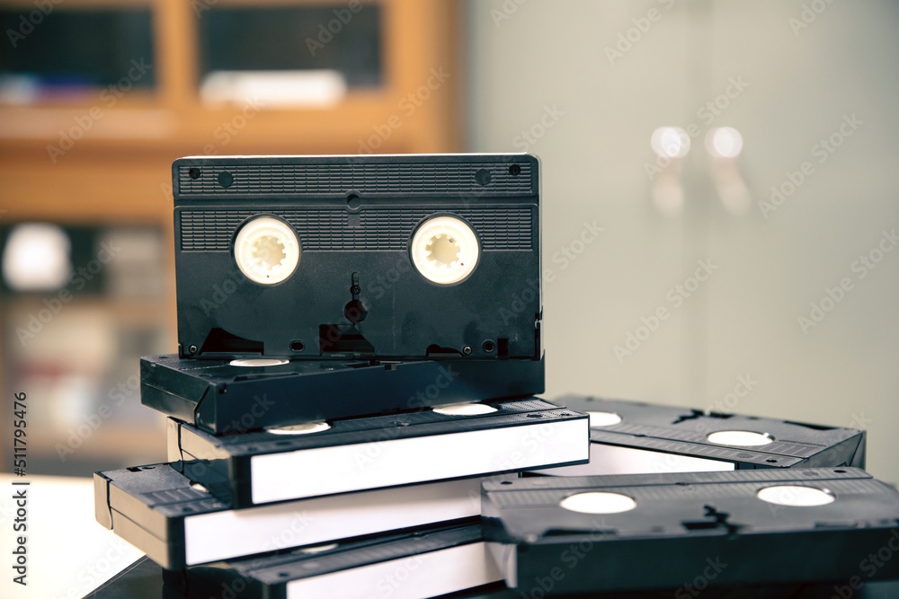 Pile of video cassette tape VHS on video playback stack concept of old ...