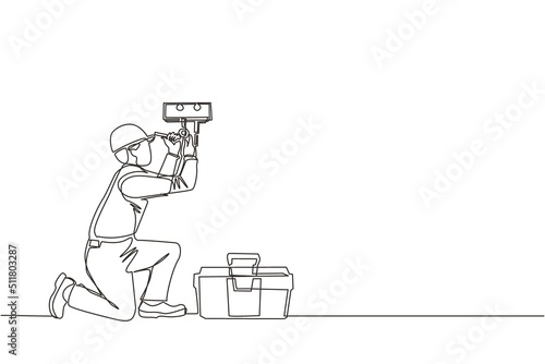 Single one line drawing male plumber in overall is installing water heater or boiler. Home repair, maintenance and plumbing services. Handyman concept. Continuous line draw design vector illustration