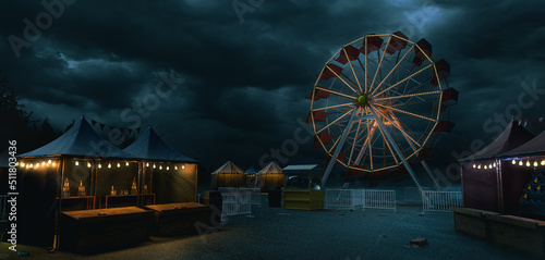 Old carnival with a ferris wheel on a cloudy day. 3D rendering, illustration