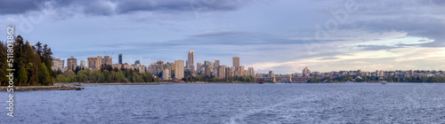 Modern City, Stanley Park, Buildings, beach and Burrard Bridge in False Creek on the West Coast of Pacific Ocean. Downtown Vancouver, British Columbia, Canada. Panoramic View. Sunset Sky © edb3_16