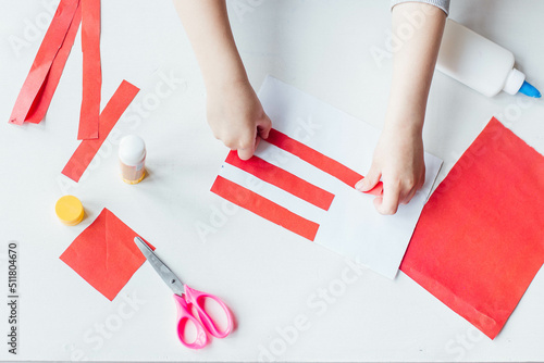 Step-by-step instruction. Child makes a postcard to the 4th of July. Patriotic holiday. Process kid children craft.USA Independence Day. Diy 4th of July decor color American flag. Flat lay top view © Наталья Мокрецова