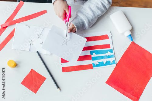 Step-by-step instruction. Child makes a postcard to the 4th of July. Patriotic holiday. Process kid children craft.USA Independence Day. Diy 4th of July decor color American flag. Flat lay top view © Наталья Мокрецова