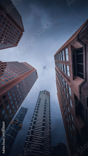 airplane between buildings 
