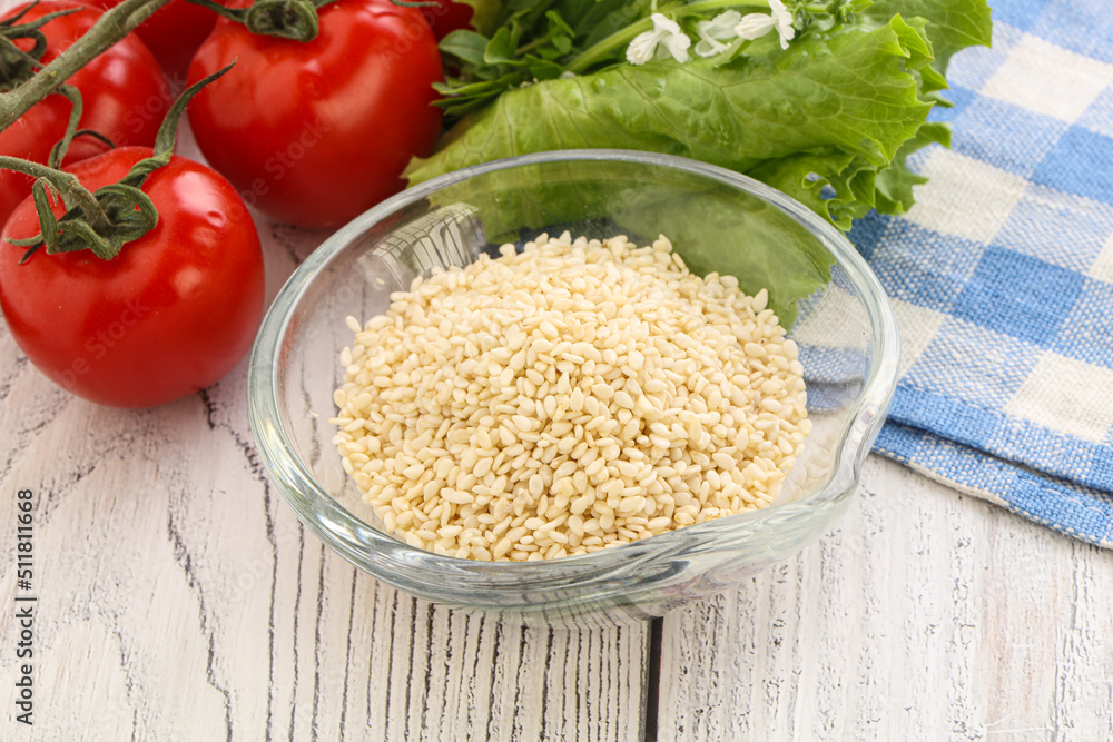 Raw sesame seeds in the bowl Raw sesame seeds in the bowl