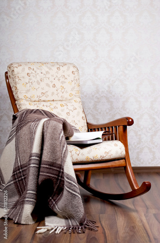 Obraz na plátně modern rocking chair near a light wall.