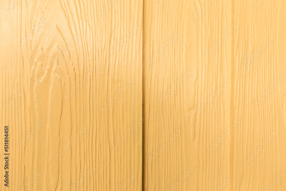 Fototapeta premium Yellow wall wooden texture for a designer background.
