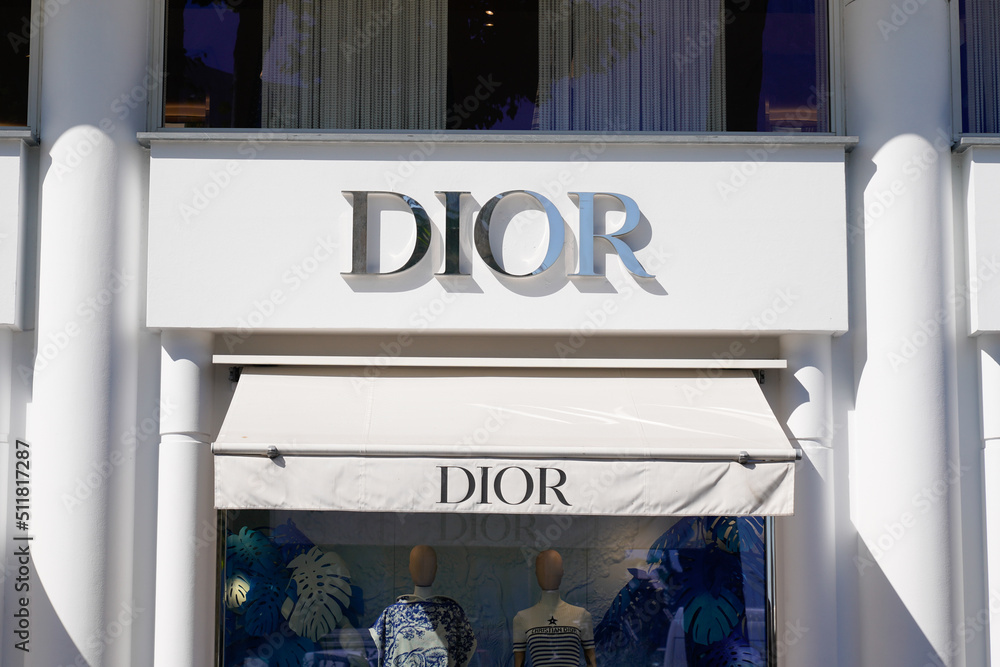Christian Dior brand logo of company text sign wall of fashion clothing  industry facade of retail shop and store Stock Photo