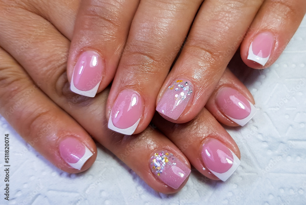 a close-up with a professional gel manicure a close-up with a professional gel manicure