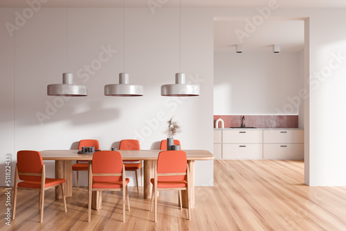 Light kitchen interior with eating table and seats, shelves and kitchenware © ImageFlow