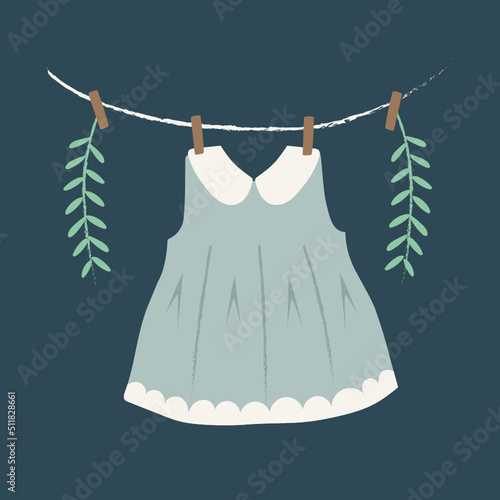 baby clothes hanging on rope