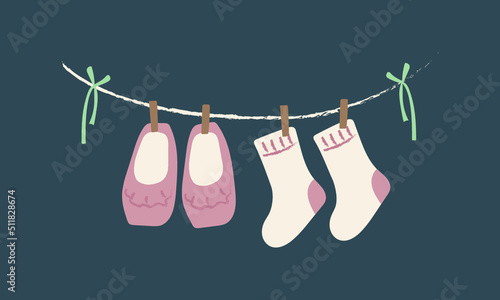 baby socks hanging on a clothesline
