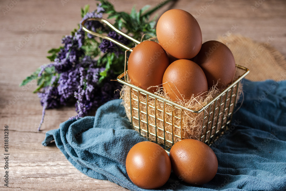 fresh chicken eggs in a metal basket fresh chicken eggs in a metal basket