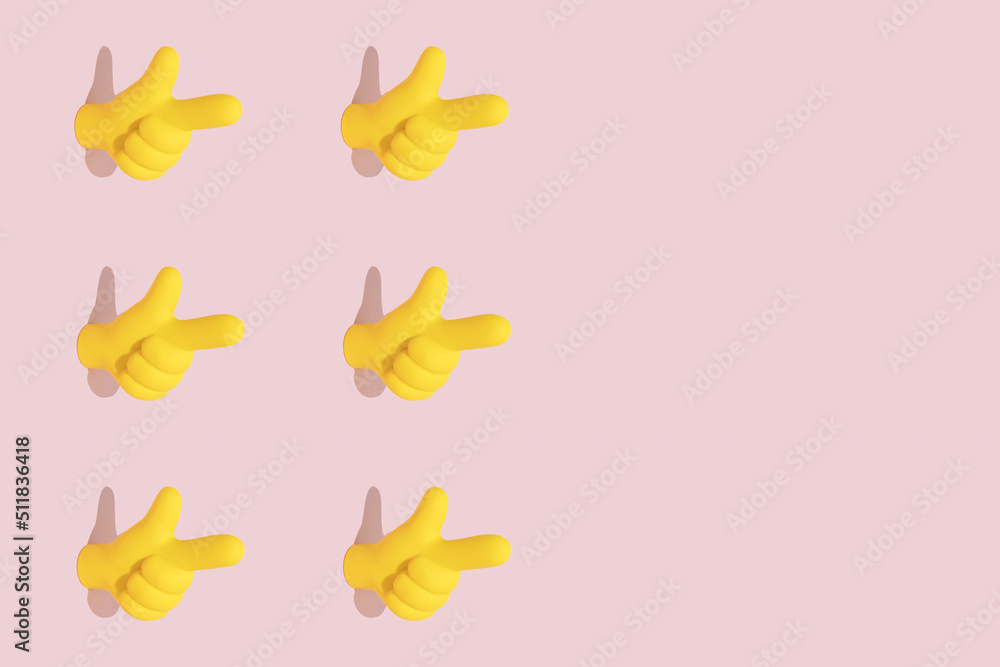 Bright yellow pointer symbol icon on pastel pink background. Hand gesture, attention or essence concept. Seamless pattern, isometric view.