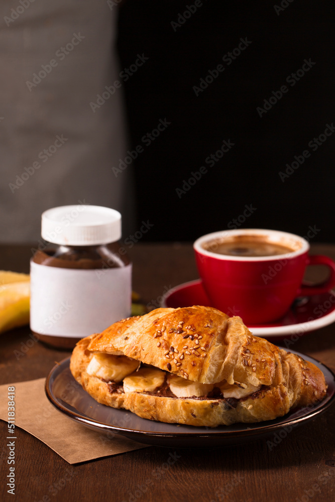 croissant with peanut butter, banana and coffee croissant with peanut butter, banana and coffee