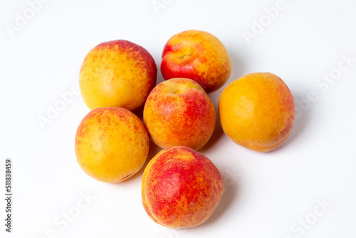 Apricots isolated on white background. Ripe fresh fruits.