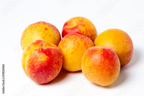 Apricots isolated on white background. Ripe fresh fruits.