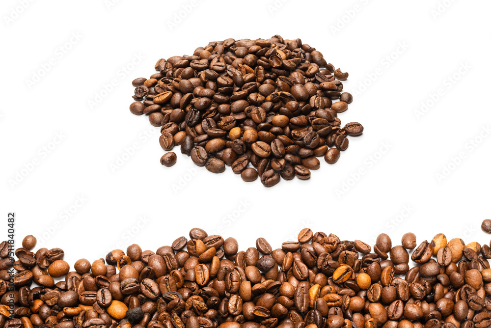 Coffee beans on a white background. Top view. Coffee beans on a white background. Top view.
