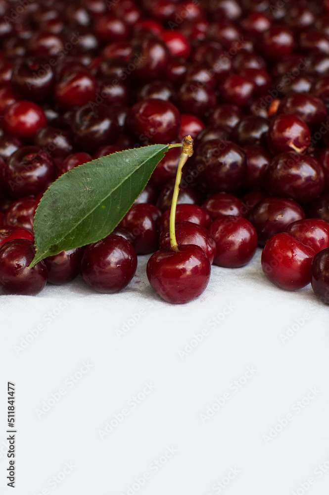 Ripe cherries close-up on a background of cherries.Summer vitamins Ripe cherries close-up on a background of cherries.Summer vitamins