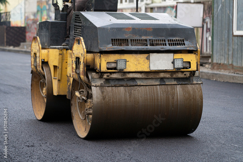 Batumi, Georgia - June 18, 2022: Asphalt paver repairs the road