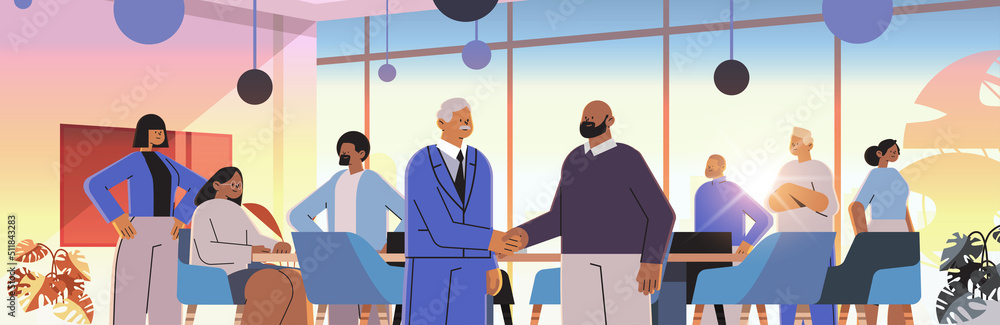 businesspeople shaking hands with each other handshake successful deal agreement partnership cooperation teamwork