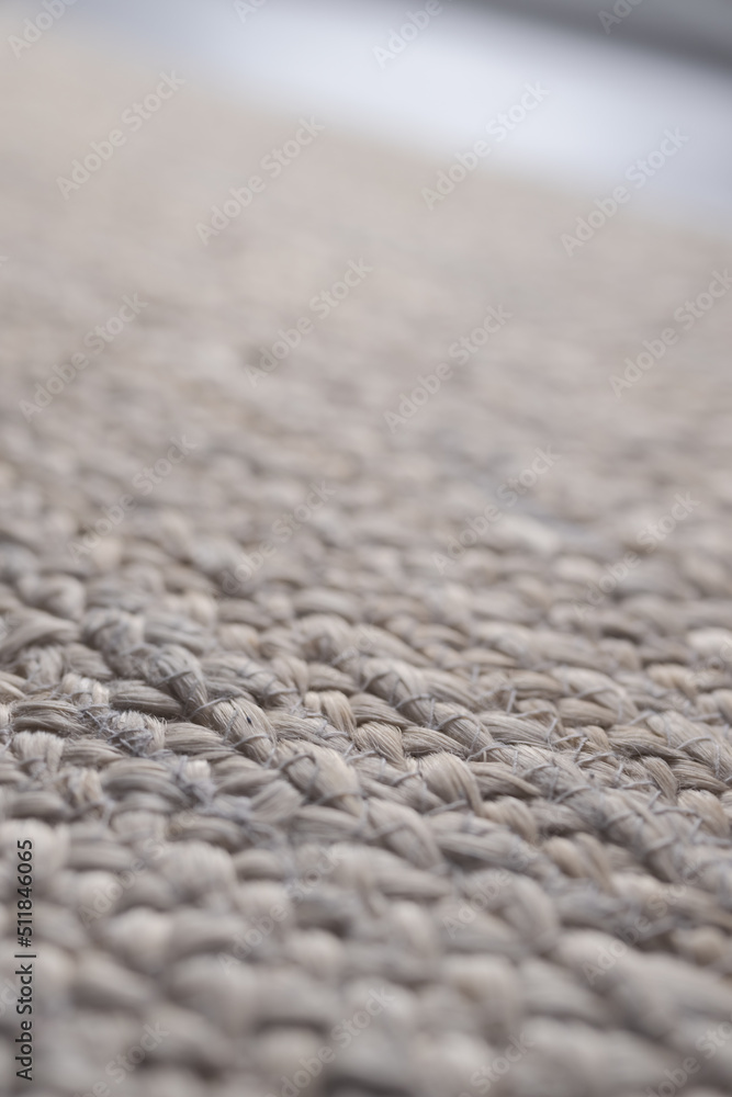 Closeup photo of jute rug on a floor Closeup photo of jute rug on a floor
