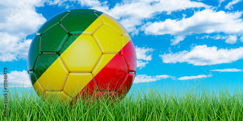 Soccer ball with Congolese flag on the green grass against blue sky  3D rendering