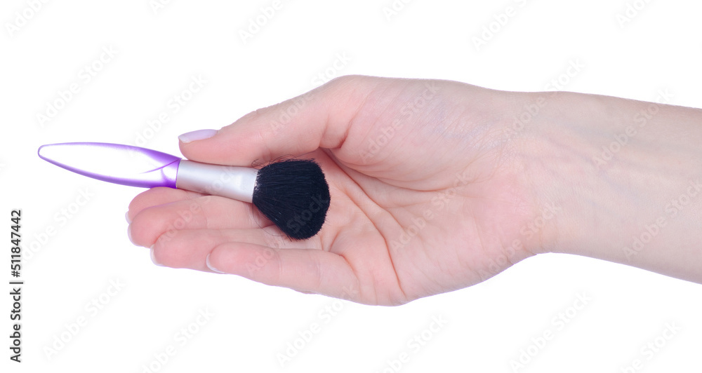 Make up brush in hand on white background isolation Make up brush in hand on white background isolation
