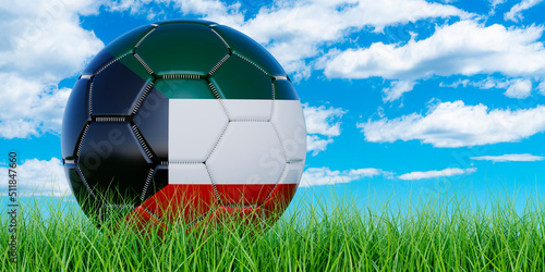 Soccer ball with Kuwaiti flag on the green grass against blue sky  3D rendering