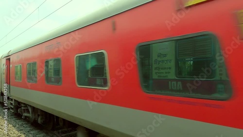 A high speed train passing. Footage taken from a running train. Howrah West Bengal India 12 June 2022