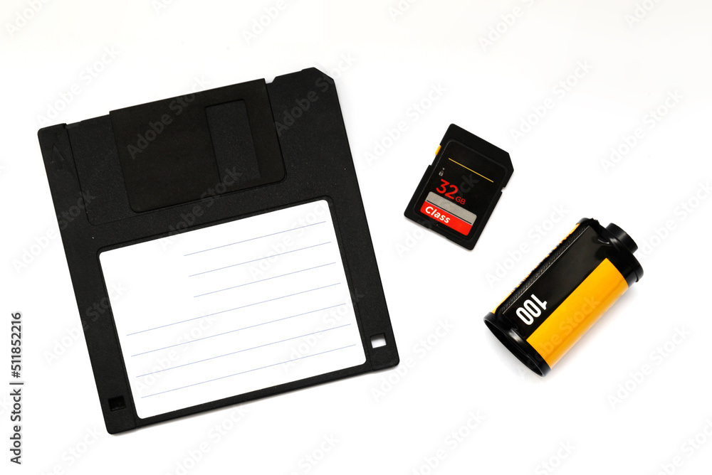photographic film and floppy disk and memory card on white background photographic film and floppy disk and memory card on white background