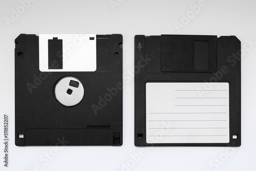 black floppy disk for an old computer on a white background photo
