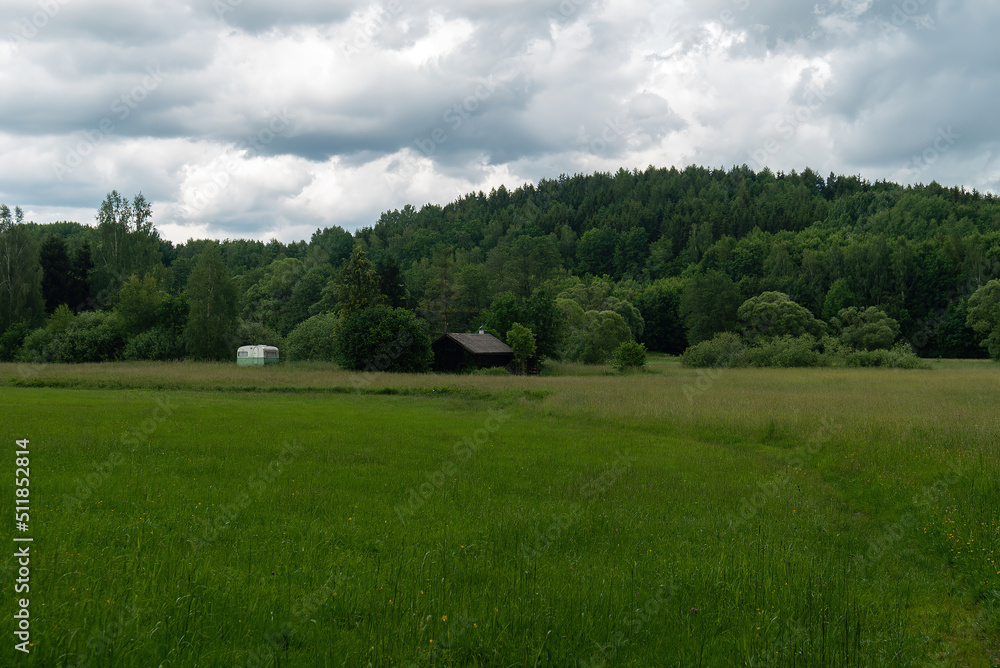 Mountains And Old Wooden Barn In The Field Mountains And Old Wooden Barn In The Field