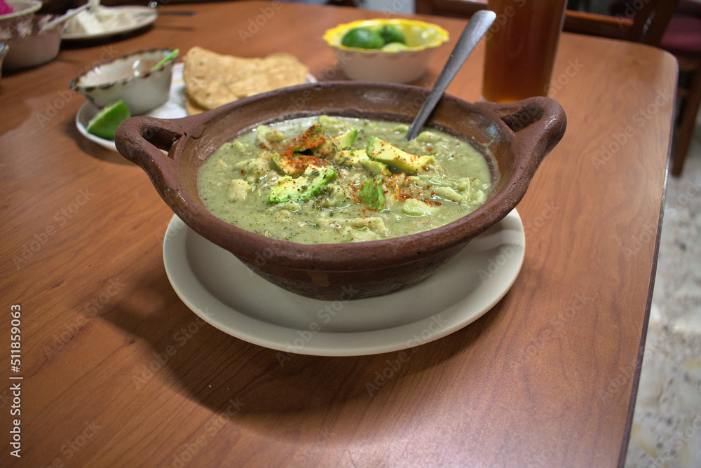 Typical mexican food served in a clay pot Typical mexican food served in a clay pot