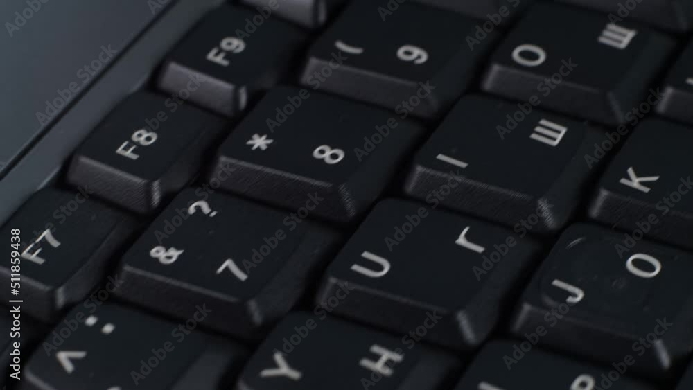 Computer keyboard with Cyrillic and Latin close-up.