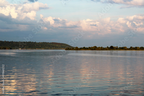 Wallpaper Mural the island with a chapel on the river sunset the sun is reflected in the water Torontodigital.ca