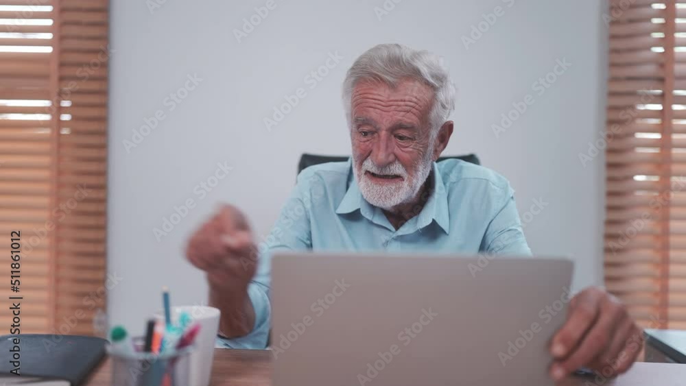 elderly caucasian businessman using laptop to work, old adult mature man using computer on desk in business office, male senior entrepreneur with technology at home workplace to teamwork communication elderly caucasian businessman using laptop to work, old adult mature man using computer on desk in business office, male senior entrepreneur with technology at home workplace to teamwork communication